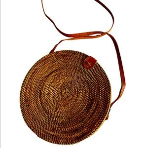 Nice Bag from Bali.  Tight Wicker weave. Lined with cotton batik. 9.5 “ diameter